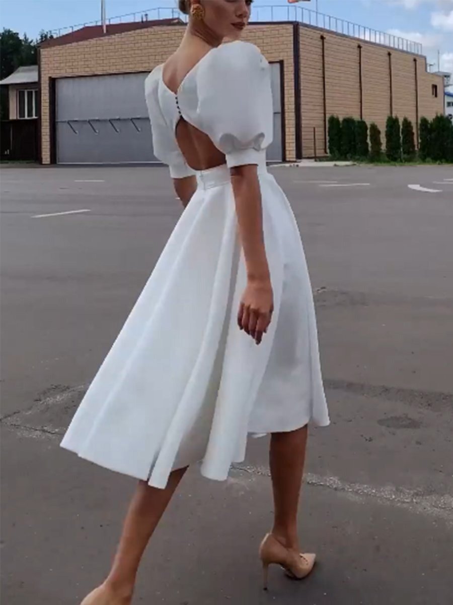 White Dress with Hollow Back Design